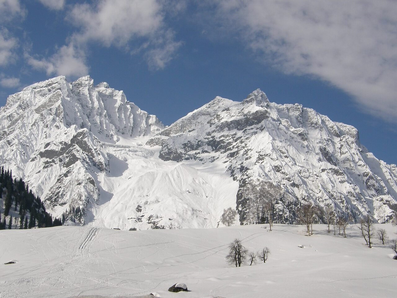 The Sonamarg valley and Pir Panjal slopes beyond a high road